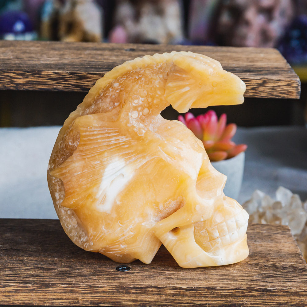 Reikistal Orange Calcite Skull With Flying Dragon