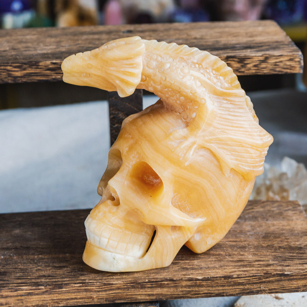 Reikistal Orange Calcite Skull With Flying Dragon
