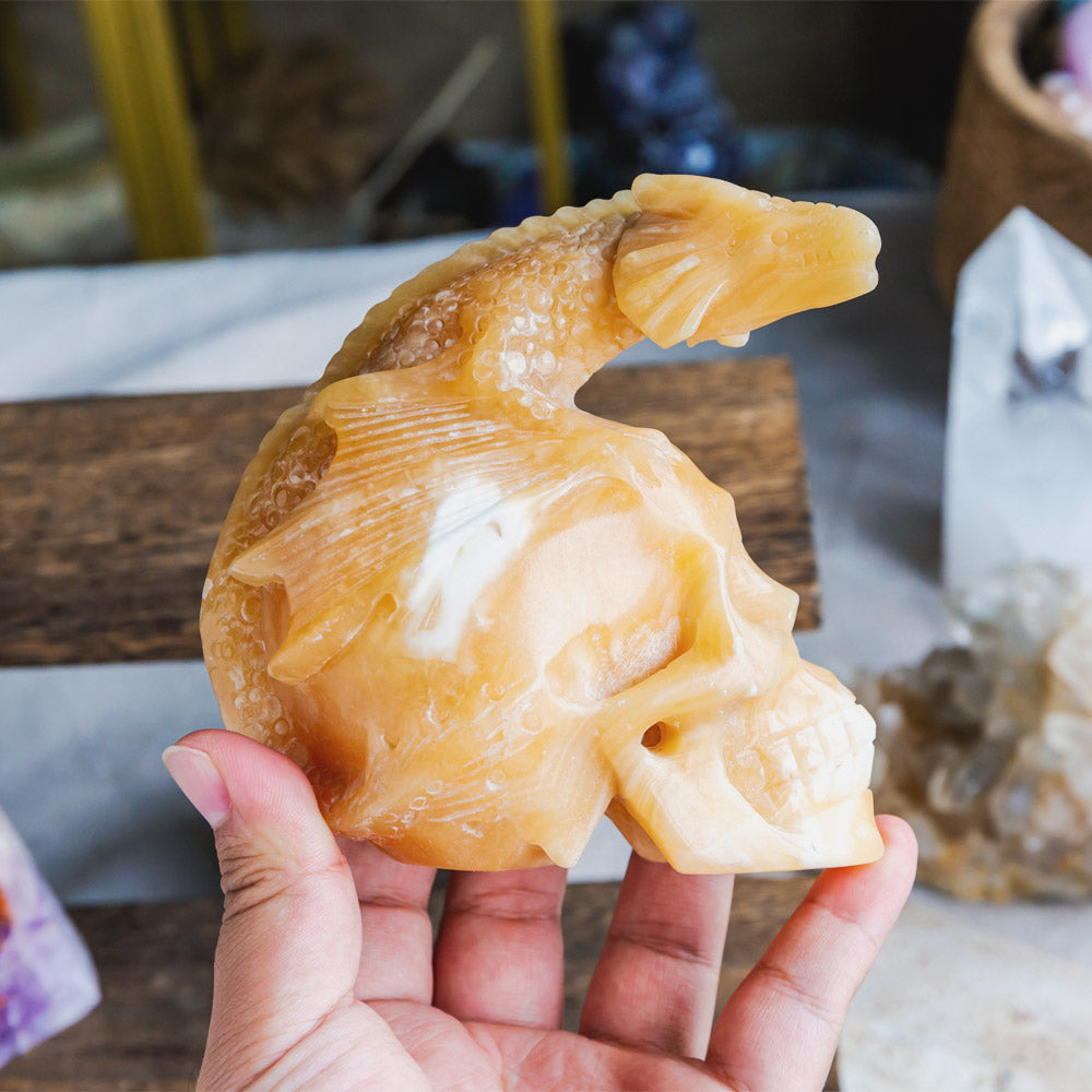 Reikistal Orange Calcite Skull With Flying Dragon