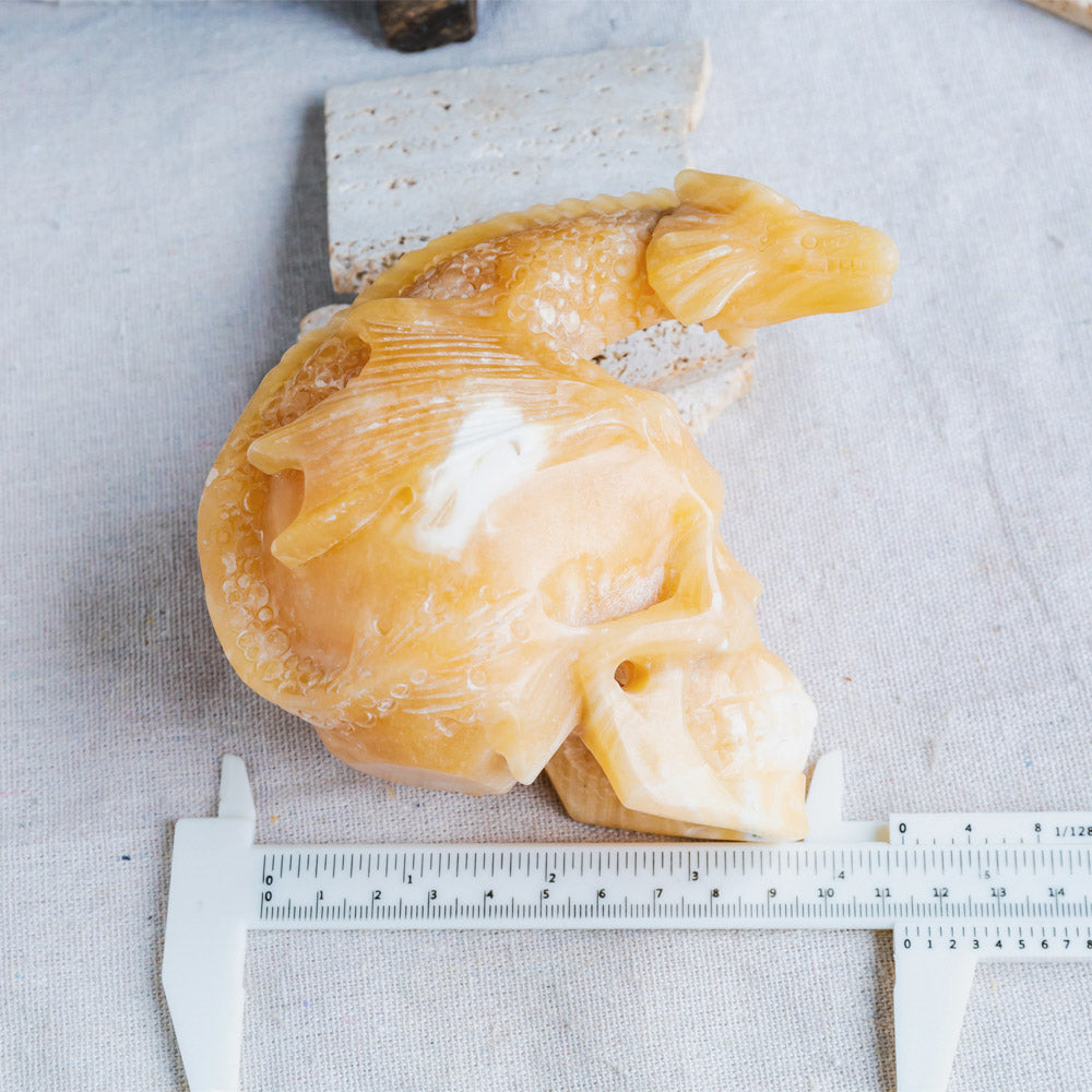 Reikistal Orange Calcite Skull With Flying Dragon