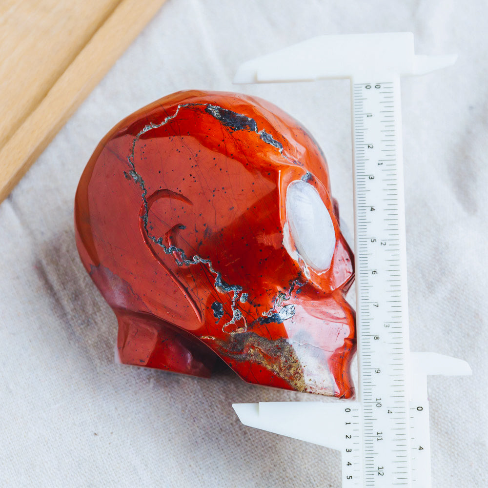 Reikistal Red Jasper Alien Skull With Moonstone Eye