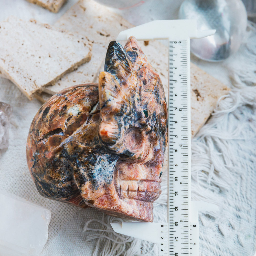 Reikistal Sunstone With Blue Apatite Mask Skull