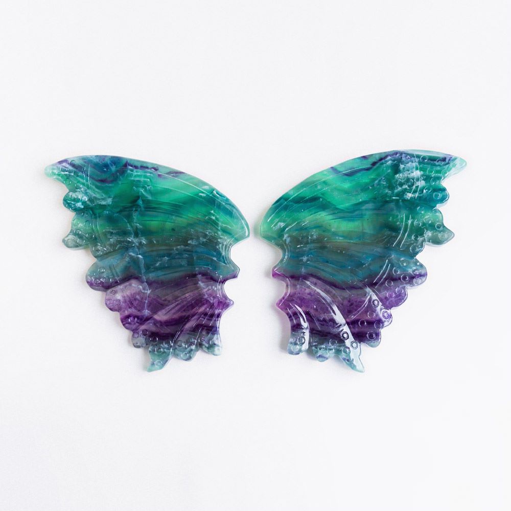Reikistal Ein Paar blaugrüne und violette Fluoritflügel